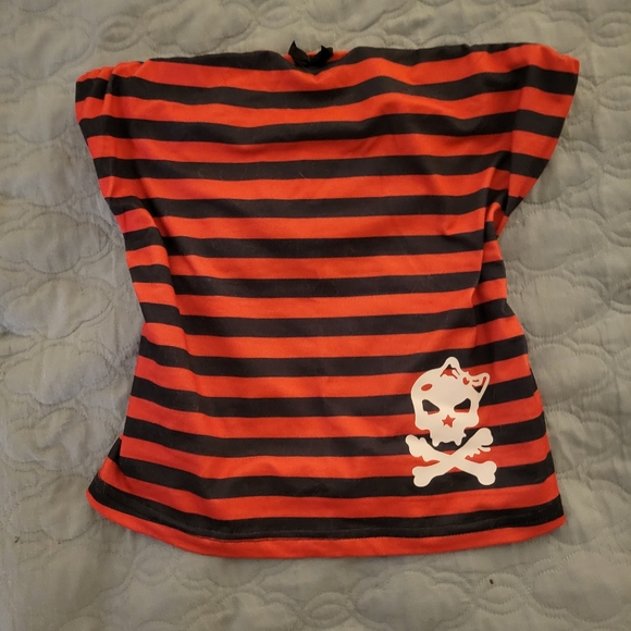 Black butt shaping leggings with side and back pockets , and a striped tube top - Picture 6 of 6